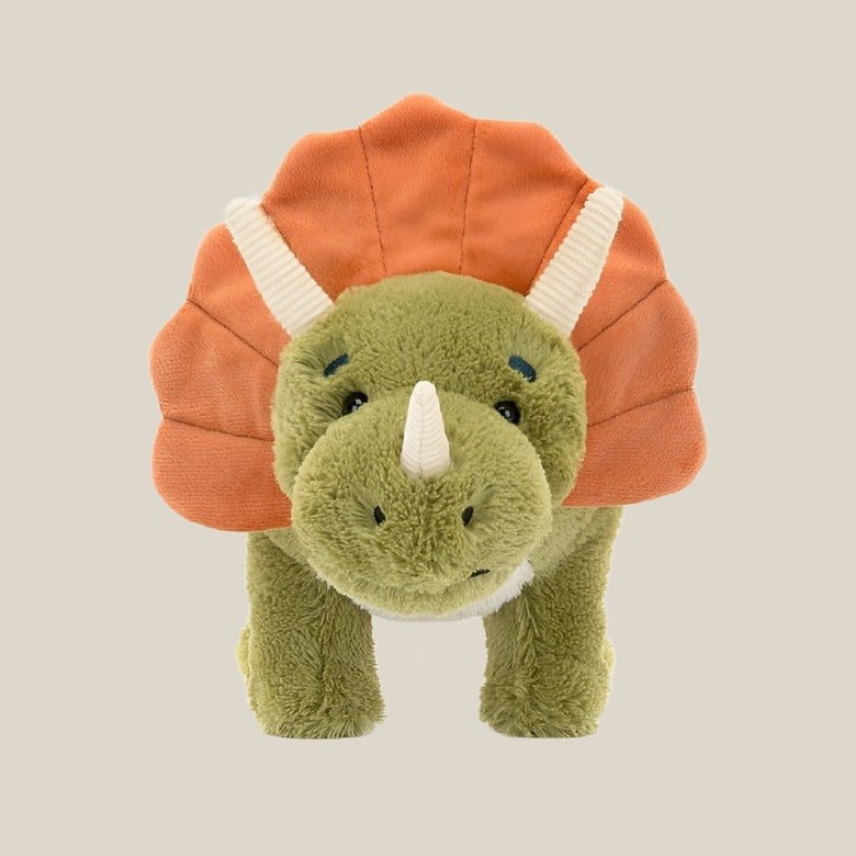 Archie Dinosaur - CanoayrasJellycat - A smiling green triceratops stuffed animal with a orange frill facing the camera