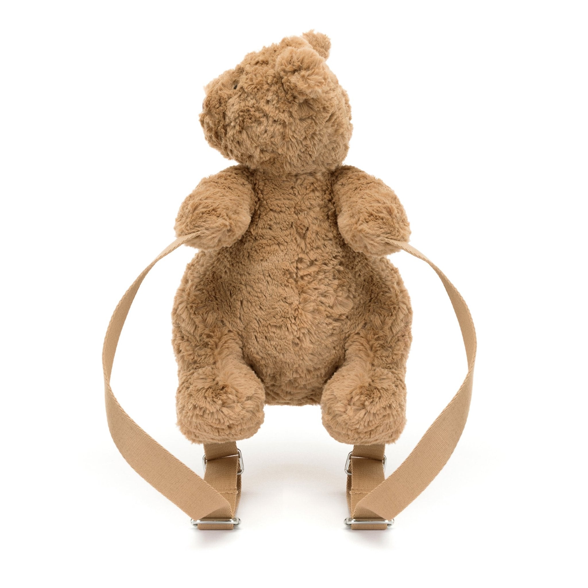 Bartholomew Bear Backpack - CanoayrasJellycat - A brown teddy bear backpack facing the camera, with its head turned to the side