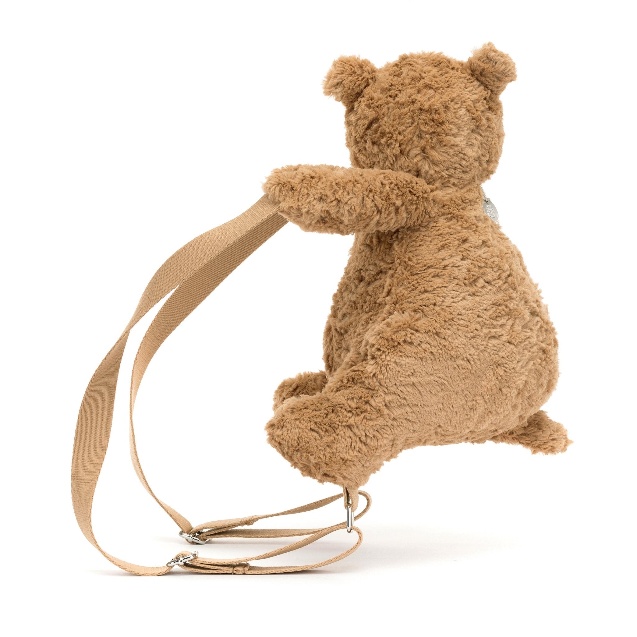 Bartholomew Bear Backpack - CanoayrasJellycat - A brown teddy bear backpack turned to the side