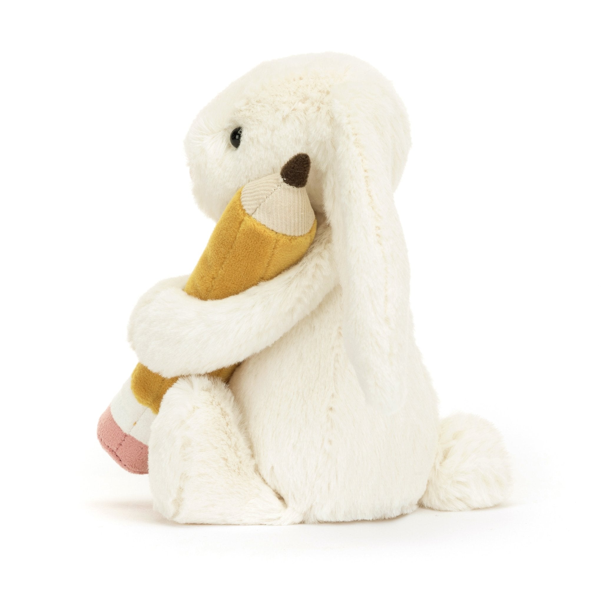 Bashful Bunny with Pencil - CanoayrasJellycat - A white bunny stuffed animal holding a pencil turned to the side